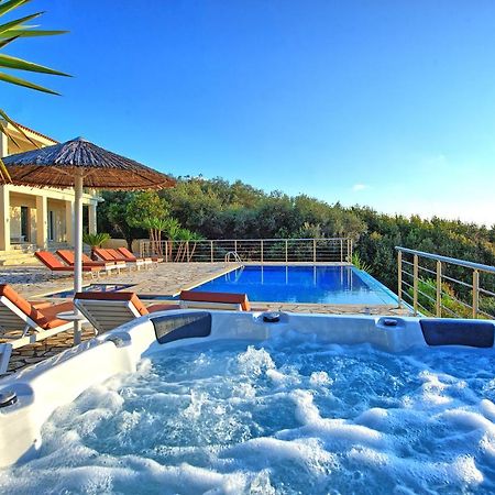Beachfront Villa Seasun By Posarellivillas Agios Spyridon  Exterior photo