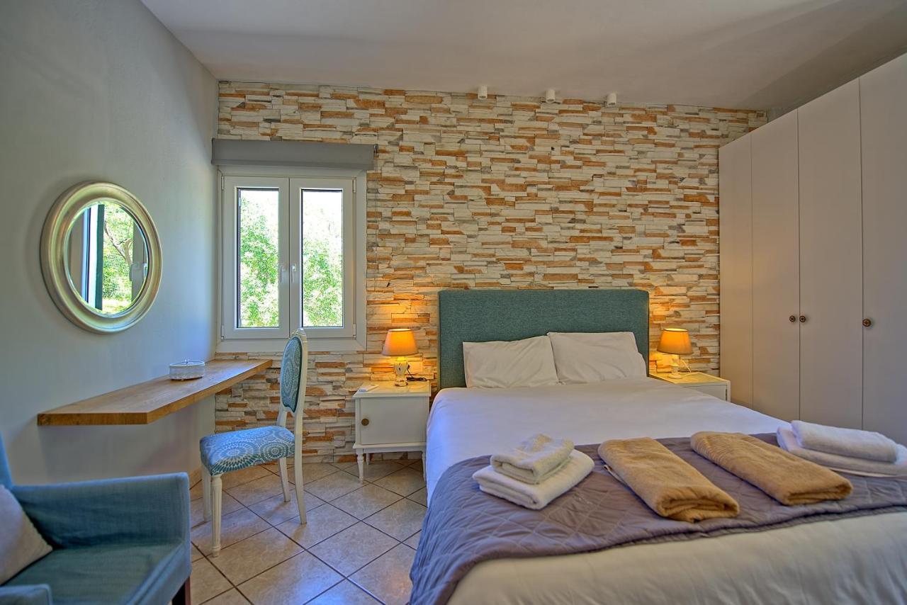 Beachfront Villa Seasun By Posarellivillas Agios Spyridon  Exterior photo